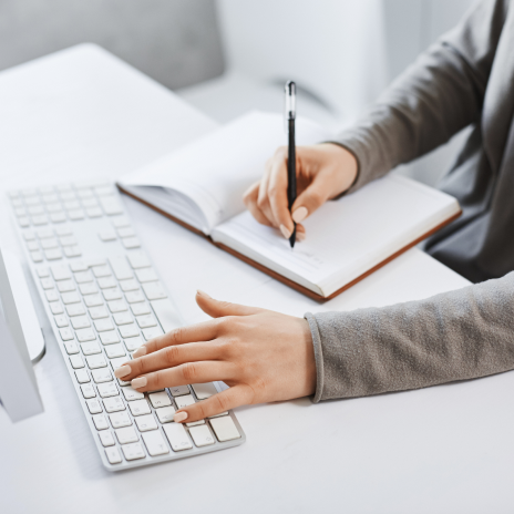 i-can-handle-multi-tasks-cropped-shot-successful-girl-typing-keyboard-making-notes-while-looking-computer-screen-studying-new-business-graphic-there-is-no-time-rest 1